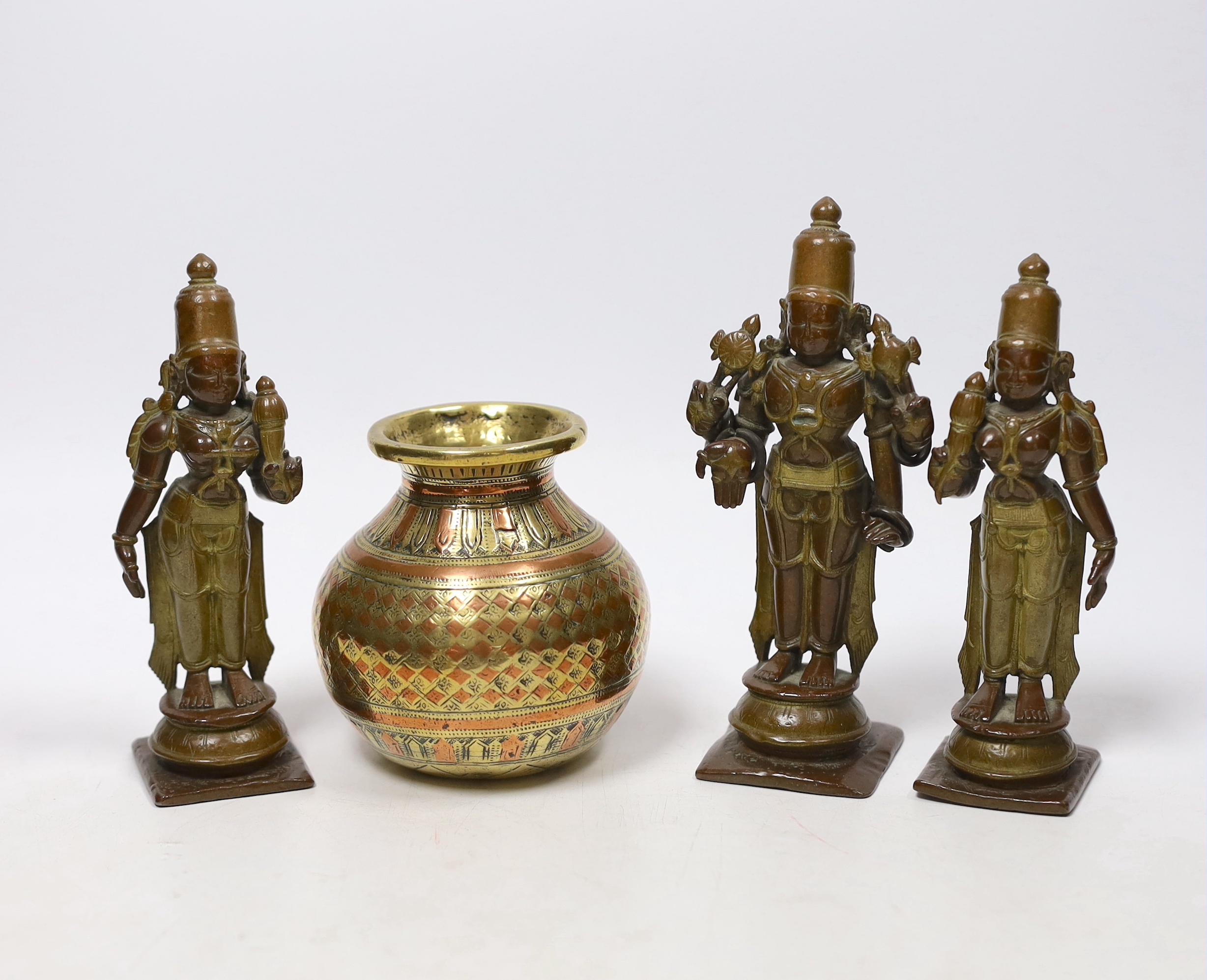 A Ganga-Jamuna figure of Vishnu and two consorts, 18th century together with a small South Indian pot, tallest 13cm
